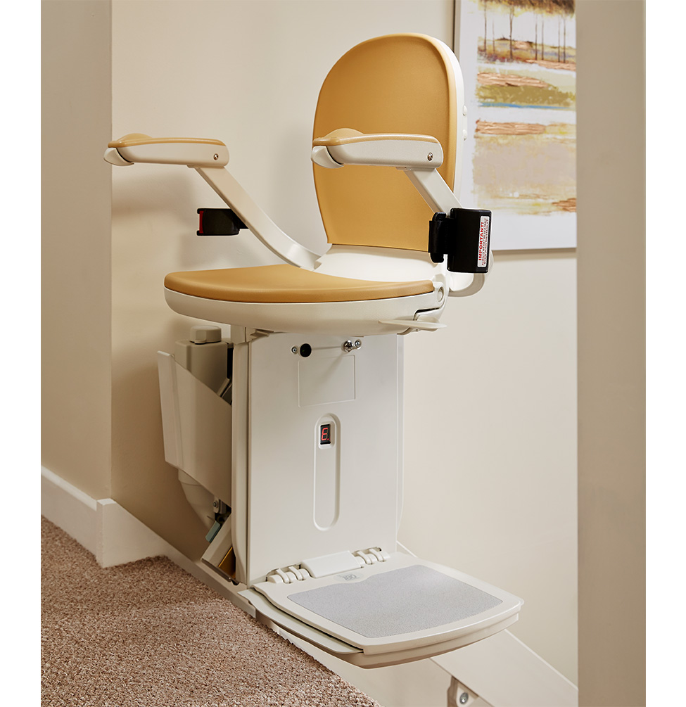 Acorn 180 curved stairlift at top of stairs
