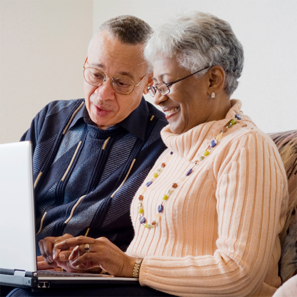 Couple Leaving Customer Feedback For Acorn